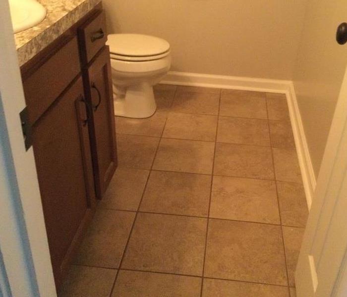 A restored bathroom after a toilet leak