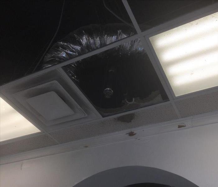 A commercial building in Madison County with water damage caused by a sprinkler system malfunction.