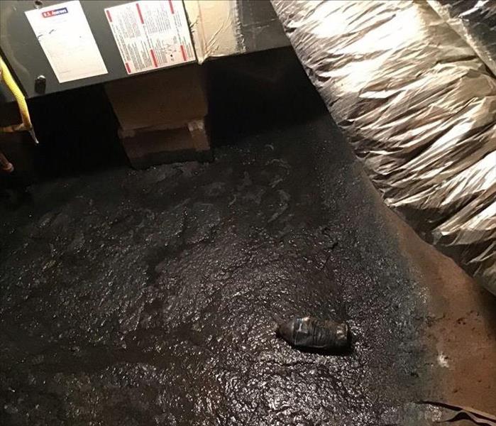 A Madison County home with a flooded crawlspace after a storm.